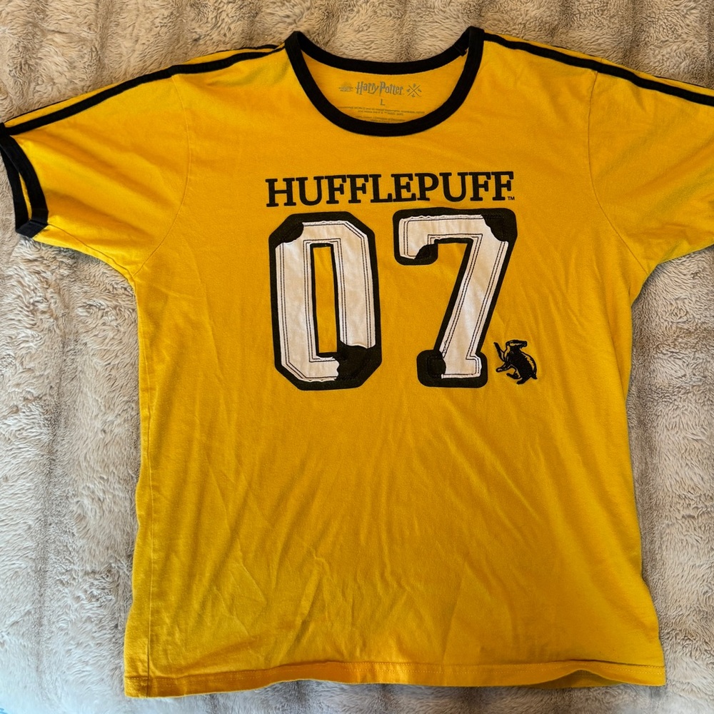 Size LARGE Hufflepuff shirt.